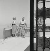 Edith and Brian Heath take in the sun on their deck in 1957.&nbsp;