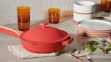 Our Place’s bestselling Always Pan, shown in the color Heat, is designed to do the work of eight pieces for $145.