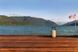 A peek at the lower-level front deck, overlooking Harrison Lake.&nbsp;