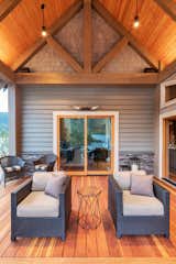 Various seating areas can be found throughout all three levels of the deck, offering differing views of the natural surroundings.  Photo 7 of 10 in A Three-Level Redwood Deck Spurs a Spellbinding Link to Nature Near Cascade Bay