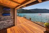 The west side of the deck near the principal suite features a covered workout area.  Photo 9 of 10 in A Three-Level Redwood Deck Spurs a Spellbinding Link to Nature Near Cascade Bay