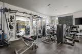 The remodeled residence includes a fitness center on the lower level.