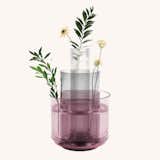 Umbra’s Layla vases play together and stay together for a unique effect. The trio—a large vase in dusty purple, a medium vase in gray smoke, and a tall, clear flute—are available individually or as a stackable set that invites experimenting with flowers, candles, candy, and more.&nbsp; &nbsp;