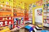 "We built the colorful library during lockdown in what is a very decent-size entrance hallway," Morag says. "I’d originally kept my books in the back studio space, but when Luke moved into it in 2017, I decided this would be the perfect place to keep them all."