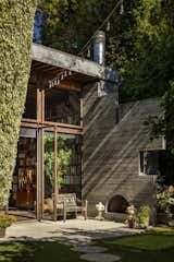 Outdoor, Back Yard, and Hanging Lighting  Photo 19 of 20 in An 11-Year Renovation Helps a Couple Grow Simpatico With the Original Homeowner’s Quirky Vision