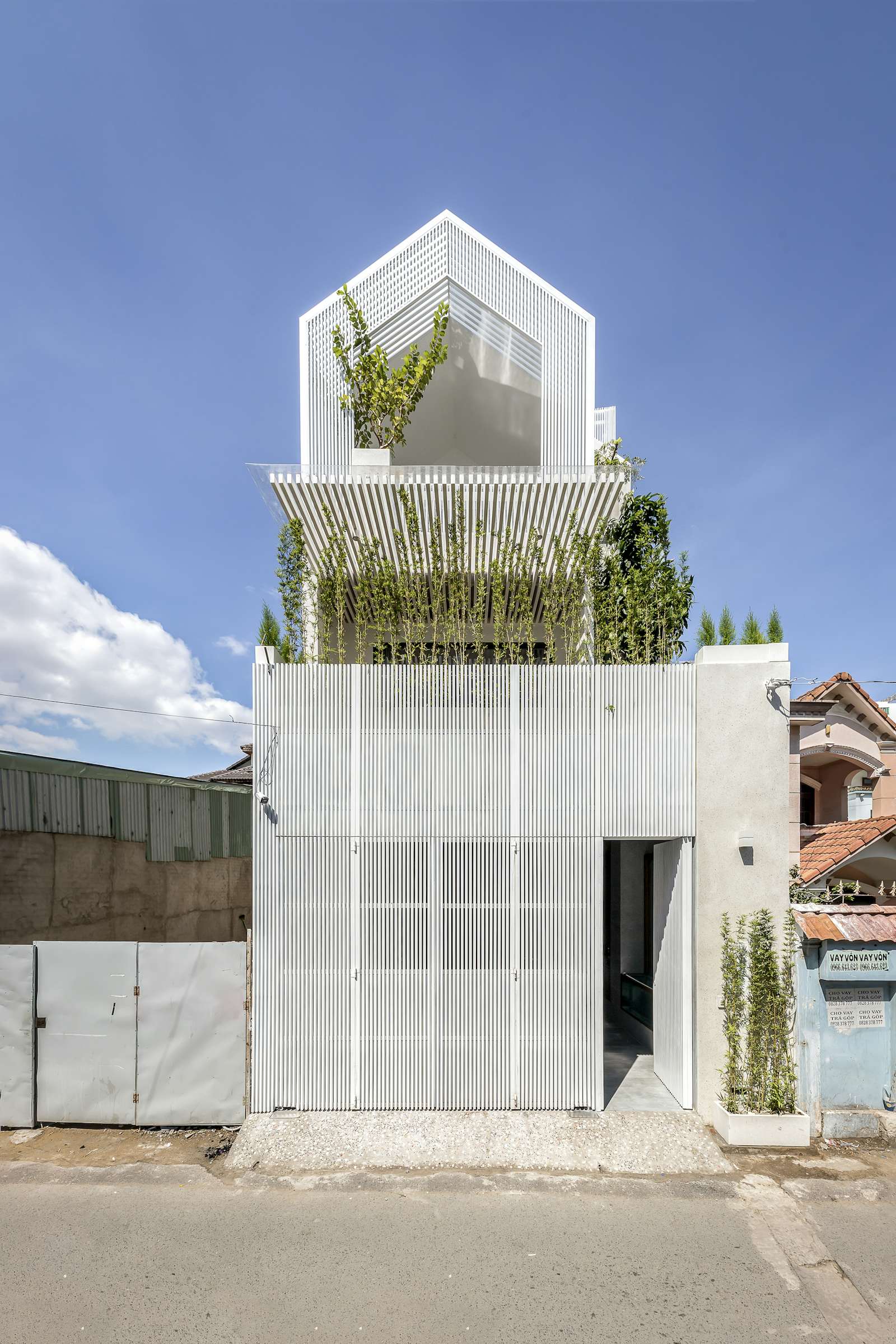 Photo 1 of 13 in A Light-Filled Atrium With a Tree House Anchors a ...