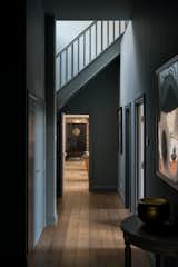 Original, mismatched oak planks line the hallway floors leading to the home's private wing.  Photo 9 of 15 in An Idyllic “Glass Barn” in the English Countryside Asks £2.3M