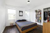 Hardwood floors continue into both of the home’s two bedrooms.