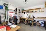 While the detached studio is currently set up as a workshop, it can easily be converted into a home office, gym, or tiny guesthouse.&nbsp;
