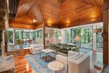 Another view of the living spaces showcasing the open layout and cohesive material palette.  Photo 5 of 12 in A Dazzling Home by Frank Lloyd Wright’s Final Apprentice Lists for the First Time