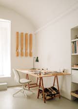 The well-lit home office can easily be converted into a gym, yoga studio, or bedroom if desired.