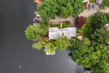 An aerial view of the property showcases its secluded, double-lot setting.