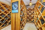 A large wine cellar on the lower level is just one of many amenities included in the home.