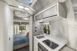 Fitted with a bedroom, bath, and kitchenette, the Airstream serves as a detached guesthouse.