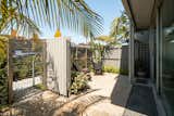 Corrugated steel borders the large lot, creating a quiet city oasis with private outdoor spaces.  Photo 2 of 14 in Listed for $2.7M, This Architect's Award-Winning Home in Southern California Is a Must-See