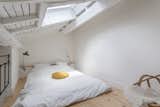 The upstairs bedrooms are illuminated by wide skylights.