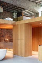 <span style="font-family: Theinhardt, -apple-system, BlinkMacSystemFont, &quot;Segoe UI&quot;, Roboto, Oxygen-Sans, Ubuntu, Cantarell, &quot;Helvetica Neue&quot;, sans-serif;">MASA Architects constructed the built-in cabinets using side-pressed and lacquered bamboo.</span>