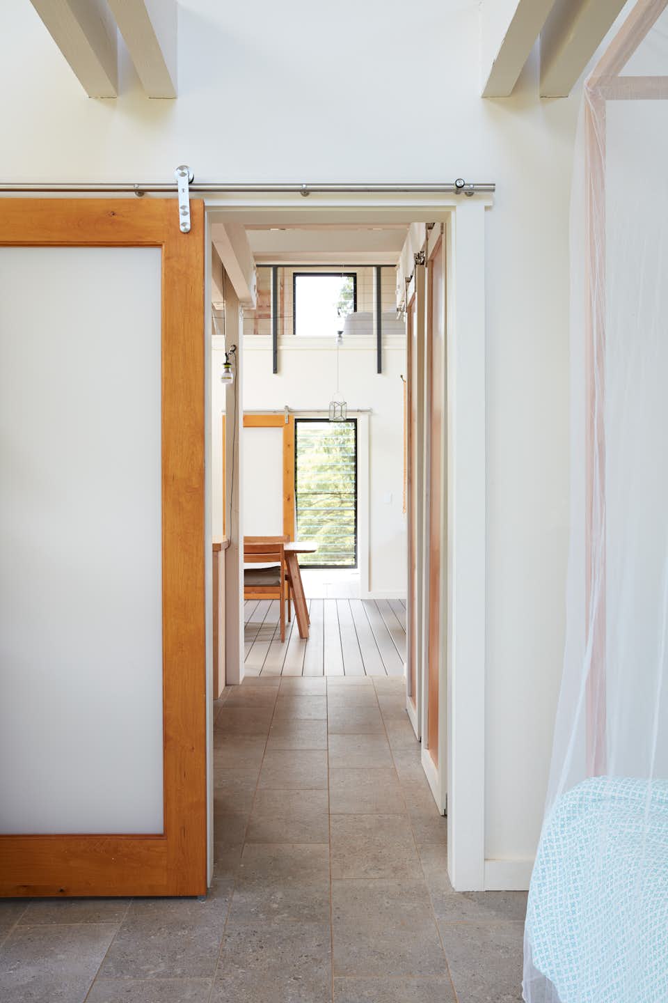 Photo 3 of 11 in Massive Sliding Doors Connect a Hawaii Home to Its