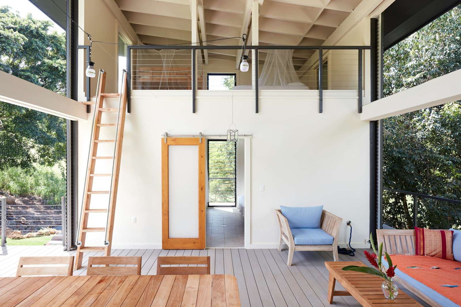Photo 8 of 11 in Massive Sliding Doors Connect a Hawaii Home to Its