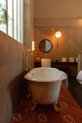 &nbsp;The bathroom in the guesthouse retains the claw-foot tub that came with the property.