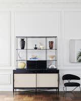 Ivory leather sliding doors, an iron frame, and FSC-certified, ebonized black oak make CB2’s Paul McCobb console and hutch (available separately) as future forward as they were when first issued.&nbsp;