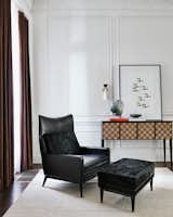 CB2’s handsome reedit of McCobb’s Embassy collection lounge chair and ottoman is covered in leather and hair on hide. A solid, FSC-certified wood base keeps the silhouette light and sleek.&nbsp;