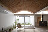 A Rippling Brick Roof Caps a Sun-Kissed Home in Argentina - Photo 9 of 14 - 