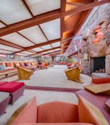 Taliesin West is a Frank Lloyd Wright masterpiece that showcases locally sourced materials, rich red hues, and thoughtful indoor/outdoor connections.
