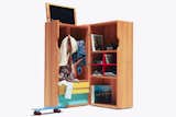 The Trunk features a hat tree, flip-up mirror, cubby holes for shoes or papers, two drawers, and two large shelves for additional storage.