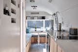 The 23-foot-long Airstream Overlander features a renovated, open layout, with the main living spaces located toward the front.&nbsp;