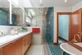 Bath Room, Porcelain Tile Floor, Enclosed Shower, Freestanding Tub, Undermount Sink, and Recessed Lighting "I've loved taking showers with my toddler in the primary bath's double shower,  Search “taking liberties” from The Oakland Home Where “Mother” of Mother’s Cookies Once Lived Asks $1.4M