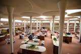 The SC Johnson Building’s one-half acre Great Workroom in Racine, Wisconsin, is known for its tree-shaped columns, which Wright referred to as "dendriform.  Photo 9 of 21 in The Ultimate Guide to Frank Lloyd Wright