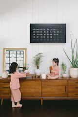 “I love that I am able to stay connected to my family, especially when I’m out of town,” Laura notes of the messaging capacity. Vestboard also integrates with wireless music apps.  Photo 1 of 5 in Meet The Stylish Analog Message Board You Never Knew You Needed