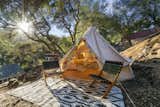Perfect for taking in sunsets and sipping morning coffee, the space can also serve as a short-term tent rental.