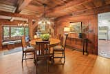 The formal dining area is sandwiched between the living room and kitchen.