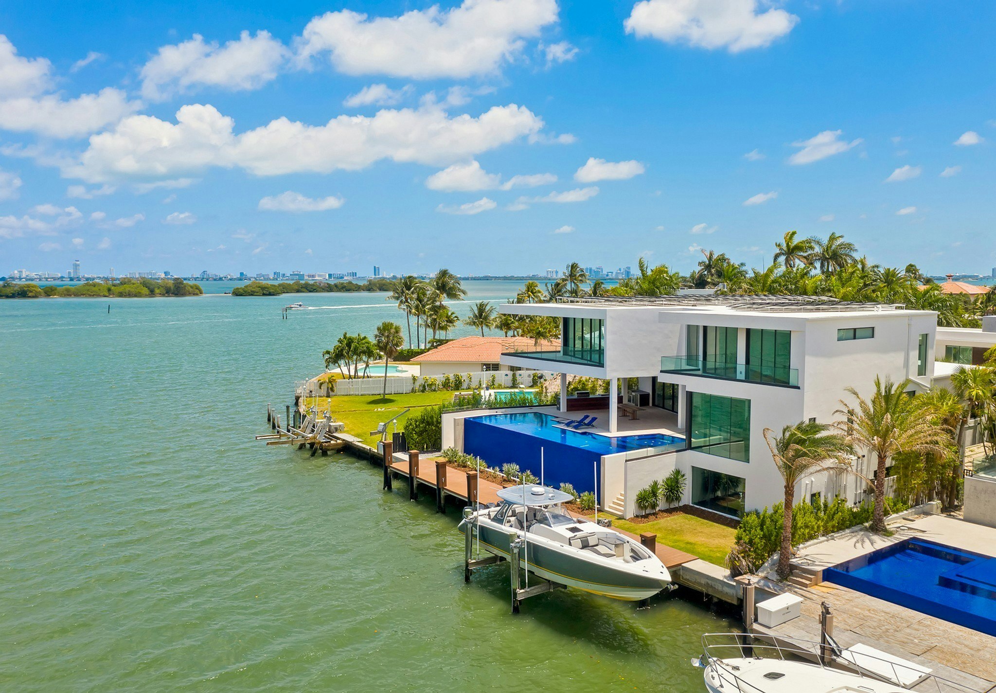 This 3-Story Residence With a Glass Elevator and Boat Lift Seeks $15M in  Miami - Dwell