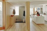 Inside, Kyu Sung’s wife, Jung-Ja Kim, a concert pianist and professor at the Boston Conservatory at Berklee, stands at the Corian-topped kitchen island.