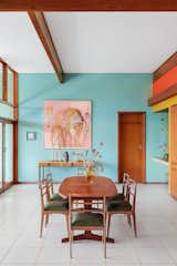 Dining Room, Chair, and Table “The house is still in its original state. Our job was to bring in some color,” says Lezanne.  Photo 4 of 10 in 9 Homes in a Range of Hues That Are Anything But Barbie Pink from Fashion Designer Lezanne Viviers’s Johannesburg Digs Double as a Studio and Concept Store