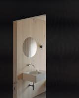 The downstairs bathroom is wrapped in English sycamore.