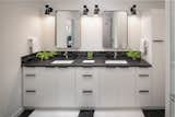 Fixtures from Helvex plumbing are incorporated into both the kitchen and bath design.