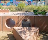 The Garden Table by Netherlands-based Studio Ossidiana and Giovanni Bellotti of Venice, Italy, is a cast concrete object with bowl-shaped herb beds, a cooking grill, sculpted areas for table games, and tunnels and steps for children to explore. The installation will become a permanent feature of the El Paseo Community Garden, a one-acre volunteer-run garden and green space owned by the nonprofit land trust NeighborSpace and located in a former brownfield in Chicago’s Pilsen neighborhood.