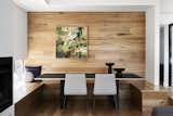 Dining Room, Table, Bench, Medium Hardwood Floor, and Chair  Photo 9 of 23 in A Multitiered Addition With a Lush Courtyard Revives a Federation-Style Melbourne Home