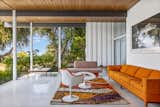 Floor-to-ceiling glazing in the main gathering spaces facilitates a sense of indoor/outdoor living.  Photo 4 of 13 in A Restored Midcentury by A. Quincy Jones Is for Rent in Los Angeles