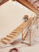 A view of the stairwell mid-construction.  Photo 5 of 16 in Construction Diary: A Stylist and a Photographer Reenvision a 1950s Bungalow