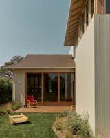 A view of the completed backyard and deck off of the living area.