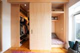 Figure Ground built a closet and meditation nook for Anna with backlit pegboard walls.