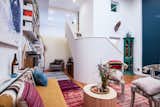 Architect Aria Jahanshahi designed a sculptural stair in the living/dining area that leads up to Thanh’s music studio. "<span style="font-family: Theinhardt, -apple-system, BlinkMacSystemFont, &quot;Segoe UI&quot;, Roboto, Oxygen-Sans, Ubuntu, Cantarell, &quot;Helvetica Neue&quot;, sans-serif;">It was exciting to have my peer group as a client, because we often spoke in a shorthand that pulled from the same histories and interests,