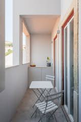 Outdoor and Small Patio, Porch, Deck  Photo 12 of 13 in A Lisbon Apartment Building Is Brought Back to Life With Tidy, Light-Filled Interiors