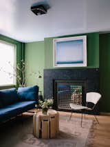 Nicko Elliott and Ksenia Kagner, founders of New York City architecture and interior design studio Civilian Projects,  overhauled a three-story townhouse in Brooklyn’s Bedford-Stuyvesant neighborhood for themselves and their young family. The garden-level family den, which doubles as a guest room, features green walls painted with Cedar Path by Benjamin Moore.&nbsp;