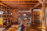 Exposed beams and timber-clad walls enhance the barn’s rustic aesthetic.